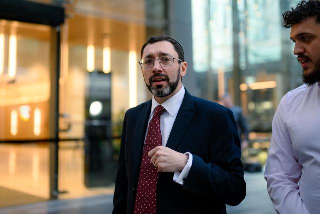 Witness Rabbi Benjamin Elton, Chief Minister of The Great Synagogue, leaves after the first hearing block of the Royal Commission on Antisemitism and Social Cohesion in Sydney on May 4, 2026. An Australian inquiry opened public hearings on May 4 into an antisemitic shooting that killed 15 people at a Jewish festival on Sydney's Bondi Beach. (Photo by GEORGE CHAN / AFP)