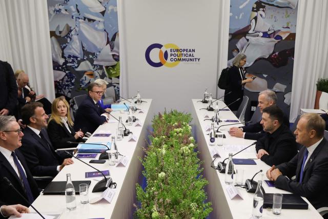 Participants, including Britain's Prime Minister Keir Starmer, France's President Emmanuel Macron, Italy's Prime Minister Giorgia Meloni, European Commission President Ursula von der Leyen, Canada's Prime Minister Mark Carney, Ukraine's President Volodymyr Zelensky, Poland's Prime Minister Donald Tusk and European Council President Antonio Costa, attend 
a roundtable discussion on Ukraine on the sidelines of the 8th European Political Community (EPC) summit in Yerevan on May 4, 2026. (Photo by Ludovic MARIN / AFP)