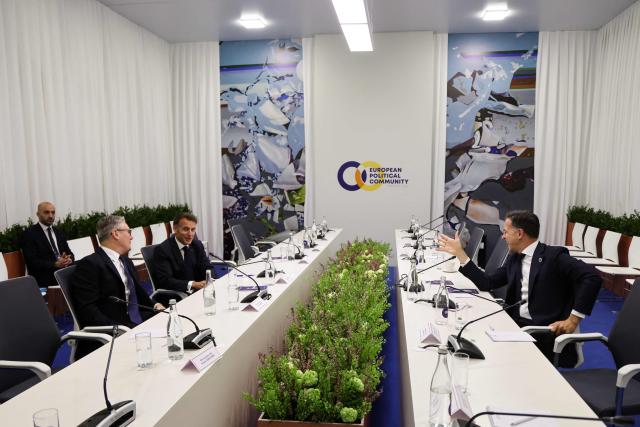 Britain's Prime Minister Keir Starmer, France's President Emmanuel Macron and NATO Secretary General Mark Rutte hold a trilateral meeting on the sidelines of the 8th European Political Community (EPC) summit in Yerevan on May 4, 2026. (Photo by Ludovic MARIN / AFP)