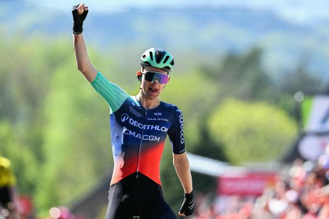 (FILES) Decathlon CMA CGM Team's French Paul Seixas celebrates as he crosses the finish line to win 'La Fleche Wallonne' one day cycling race, 200 km from Herstal to Huy, on April 22, 2026. Paul Seixas, the French cycling prodigy, announced on May 4, 2026, that he would be competing in the Tour de France this summer, becoming, at the age of 19, the youngest rider to take part in the race in 89 years. (Photo by JOHN THYS / AFP)