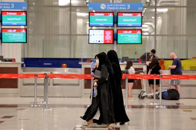 (FILES) A picture shows the terminal 3 at Dubai international Airport, in the Gulf emirate of Dubai, on August 16, 2022. Dubai airport's passenger traffic plunged by two-thirds in March following Iran's attacks on the United Arab Emirates during the Middle East war, the emirate's media office said in a statement on May 4, 2026. Traveller numbers at Dubai International, usually the world's busiest for international passenger traffic, sank to 2.5 million, down 66 percent year on year, Dubai Media Office said. (Photo by Giuseppe CACACE / AFP)