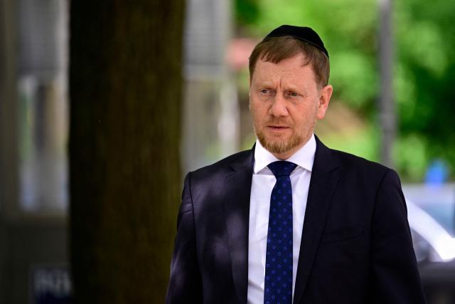 Saxony's State Premier Michael Kretschmer arrives in front of the Chabad Synagogue in Berlin, Germany, where the leadership of his Christian Democratic Union (CDU) party meets on May 4, 2026. (Photo by Tobias SCHWARZ / AFP)