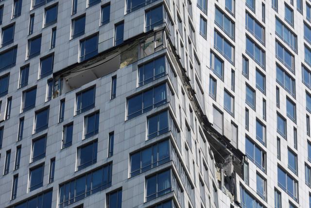 A view shows damage to a high-rise residential building following a drone attack in Moscow on May 4, 2026. (Photo by TATYANA MAKEYEVA / AFP)
