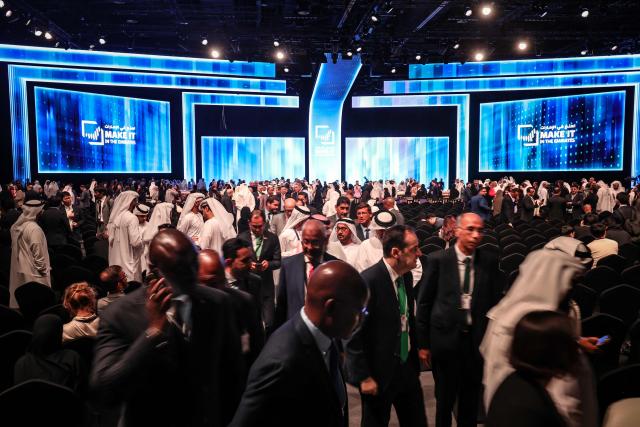 Attendees leave the 5th edition of "Make it in the Emirates" in Abu Dhabi on May 4, 2026. (Photo by FADEL SENNA / AFP)