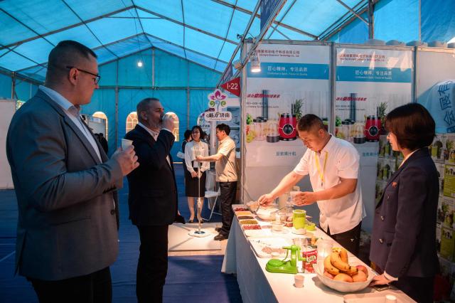 Visitors attend the 24th Pyongyang Spring International Trade Fair opening at the Central Youth Hall in Pyongyang on May 4, 2026. (Photo by KIM Won Jin / AFP)