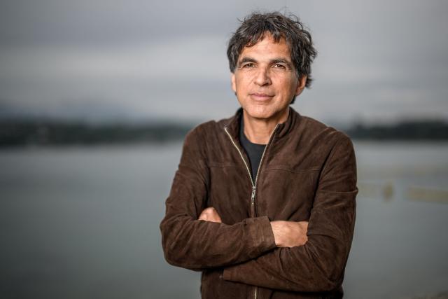 Swiss editorial cartoonist Patrick Chappatte poses during the exhibition “Dessins pour la libertй” (“Drawings for Freedom”), held to mark World Press Freedom Day on the shores of Lake Geneva in Geneva on May 4, 2026. (Photo by Fabrice COFFRINI / AFP)