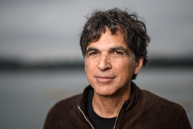 Swiss editorial cartoonist Patrick Chappatte poses during the exhibition “Dessins pour la libertй” (“Drawings for Freedom”), held to mark World Press Freedom Day on the shores of Lake Geneva in Geneva on May 4, 2026. (Photo by Fabrice COFFRINI / AFP)
