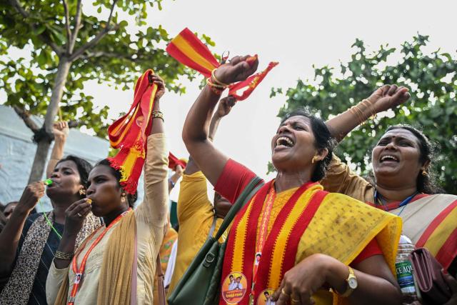 Supporters and members of Indian actor C. Joseph Vijay's Tamilaga Vettri Kazhagam (TVK) party celebrate after TVK leads in the vote counting for the Tamil Nadu Legislative Assembly elections in Chennai on May 4, 2026. Votes were being counted under tight security in the state of 100 million people, one of five states and territories that held elections in April and May where results were also due on May 4. Veteran politician MK Stalin was trailing in the southern state of Tamil Nadu, where he was challenged by a political debutant -- film star C. Joseph Vijay. (Photo by R. Satish BABU / AFP)