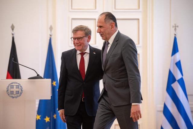 German Foreign Minister Johann Wadephul (L) leaves with Greek Foreign Minister George Gerapetritis after a press conference at the Ministry of Foreign Affairs in Athens, on May 4, 2026. (Photo by Angelos TZORTZINIS / AFP)