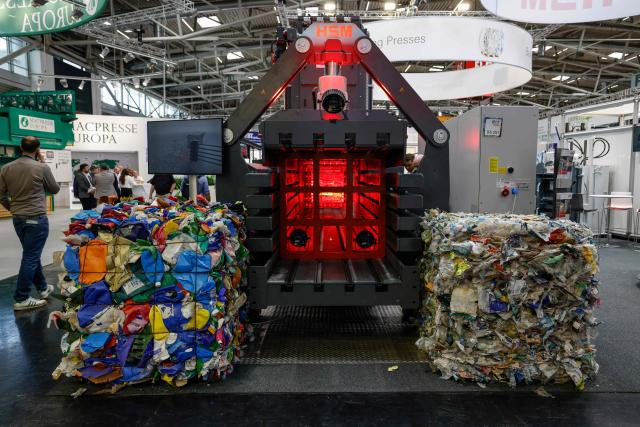 Compacted waste that went through a baling press systems by HSM is seen at the IFAT Munich, a trade fair dedicated to environmental technologies across water, wastewater, waste and resource management, in Munich, southern Germany, on May 4, 2026. According to organisers, more than 3,000 exhibitors from more than 60 countries are presenting their strategies and innovations during the fair running until May 7, 2026. (Photo by Michaela STACHE / AFP)