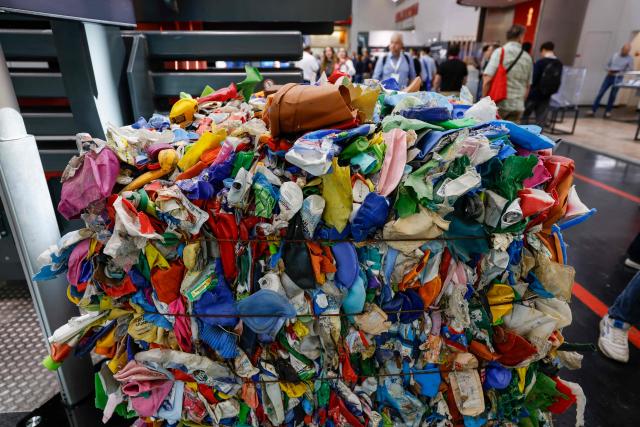 Compacted waste that went through a baling press systems by HSM is seen at the IFAT Munich, a trade fair dedicated to environmental technologies across water, wastewater, waste and resource management, in Munich, southern Germany, on May 4, 2026. According to organisers, more than 3,000 exhibitors from more than 60 countries are presenting their strategies and innovations during the fair running until May 7, 2026. (Photo by Michaela STACHE / AFP)