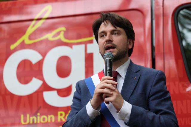 La France Insoumise - Nouveau Front Populaire's MP Aurelien Saintoul speaks during a rally in front of the National Assembly to protest against the military spending bill, in Paris on May 4, 2026. (Photo by Xavier GALIANA / AFP)