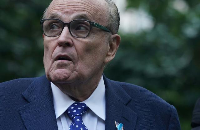 (FILES) Former New York Mayor Rudy Giuliani attends a remembrance ceremony on the 22nd anniversary of the terror attack on the World Trade Center, in New York City on September 11, 2023. Former New York mayor Rudy Giuliani is hospitalized in "critical but stable condition," his spokesman said on May, 2026, without disclosing what ails the 81-year-old former politician. (Photo by Bryan R. Smith / AFP)