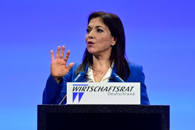 German Economy and Energy Minister Katherina Reiche addresses guests during the economic policy summit (Wirtschaftstag) in Berlin on May 4, 2026. The two-day summit brings together key players from politics and business. (Photo by John MACDOUGALL / AFP)