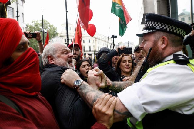 Police and protesters face off during a May Day march and rally in central London on May 4, 2026, to mark the 100th anniversary of the "General Strike" in 1926. (Photo by Brook Mitchell / AFP)