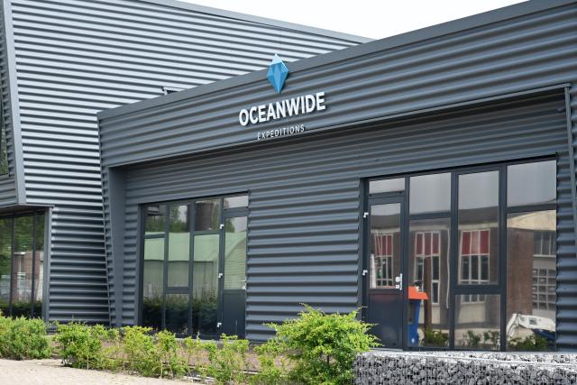 This photograph shows the OceanThis photograph shows the logo of Oceanwide Expeditions at the headquarters in Vlissingen on May 4, 2026.ide Expeditions headquarters in Vlissingen on May 4, 2026. Strict precautionary measures including isolation are in place on a cruise ship anchored off Cape Verde on which a suspected outbreak of hantavirus has killed three people, the cruise operator  said on May 4, 2026. (Photo by Nicolas TUCAT / AFP)