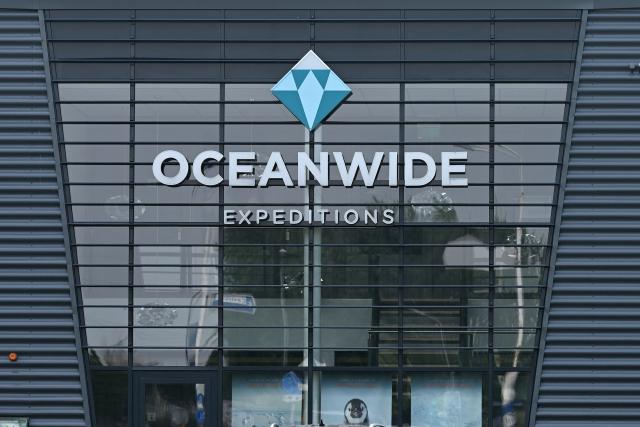 This photograph shows the logo of Oceanwide Expeditions at the headquarters in Vlissingen on May 4, 2026. Strict precautionary measures including isolation are in place on a cruise ship anchored off Cape Verde on which a suspected outbreak of hantavirus has killed three people, the cruise operator  said on May 4, 2026. (Photo by Nicolas TUCAT / AFP)