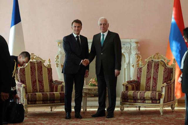 France's President Emmanuel Macron and Armenia's President Vahagn Khachaturyan hold a meeting at the presidential palace in Yerevan on May 4, 2026. (Photo by Ludovic MARIN / AFP)