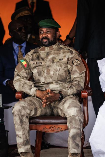 (FILES) Malis interim leader and head of Junta, Colonel Assimi Goïta looks on, in Bamako, Mali, on September 22, 2022 during Mali's Independence Day military parade. Mali's junta leader, Assimi Goïta, will assume the additional role of defence minister, according to a decree read on state TV on May 4, 2026, following the death of the previous minister in large-scale attacks.
Mali is facing a security crisis after an assault led by Tuareg separatists and Al-Qaeda-linked jihadists on several junta strongholds more than a week ago, during which Defence Minister Sadio Camara was killed by a car bomb at his residence. (Photo by OUSMANE MAKAVELI / AFP)