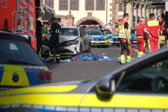 Members of the emergency services work at the scene where several people were injured during an incident involving a car in the city centre in Leipzig, eastern Germany on May 4, 2026. "A car drove through the city center," a police spokeswoman told AFP news agency. The spokeswoman could not initially give a specific number of injured. The situation is "unclear." (Photo by Sebastian Willnow / dpa / AFP) / Germany OUT