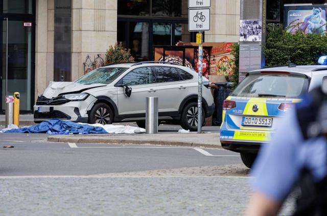 Picture taken on on May 4, 2026 shows the scene where a car ploughed into people on a street leaving at least two dead and several injured, in the city centre in Leipzig, eastern Germany. Leipzig mayor Burkhard Jung confirmed the deaths, adding nothing was known about the motive of the vehicle driver. Police said the driver had been arrested and no longer posed a danger. (Photo by John MACDOUGALL / AFP)