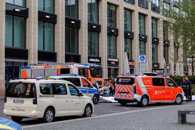 Members of the emergency services work at the scene where a car ploughed into people on a street leaving at least two dead and several injured, in the city centre in Leipzig, eastern Germany on May 4, 2026. Leipzig mayor Burkhard Jung confirmed the deaths, adding nothing was known about the motive of the vehicle driver. Police said the driver had been arrested and no longer posed a danger. (Photo by Jens SCHLUETER / AFP)