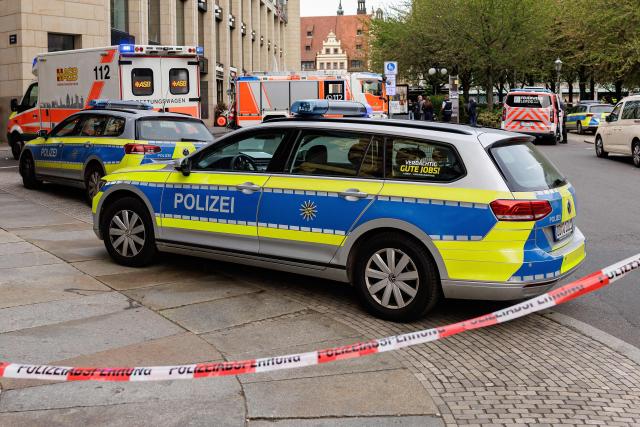Members of the emergency services work at the scene where a car ploughed into people on a street leaving at least two dead and several injured, in the city centre in Leipzig, eastern Germany on May 4, 2026. Leipzig mayor Burkhard Jung confirmed the deaths, adding nothing was known about the motive of the vehicle driver. Police said the driver had been arrested and no longer posed a danger. (Photo by Jens SCHLUETER / AFP)