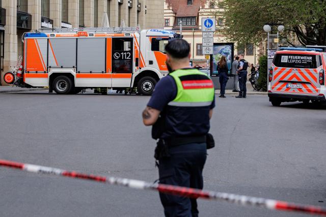 Members of the emergency services work at the scene where a car ploughed into people on a street leaving at least two dead and several injured, in the city centre in Leipzig, eastern Germany on May 4, 2026. Leipzig mayor Burkhard Jung confirmed the deaths, adding nothing was known about the motive of the vehicle driver. Police said the driver had been arrested and no longer posed a danger. (Photo by Jens SCHLUETER / AFP)
