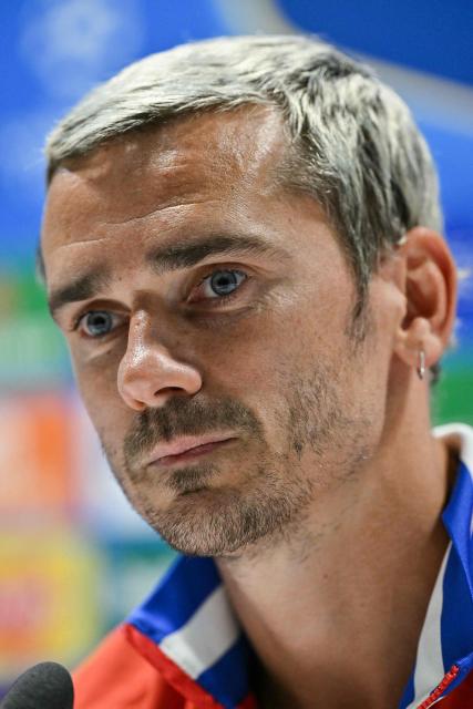 Atletico Madrid's French forward #07 Antoine Griezmann attends a press conference at Emirates Stadium in London on May 4, 2026, on the eve of their UEFA Champions League league semifinal, second-leg football match against Arsenal.  (Photo by Glyn KIRK / AFP)