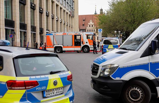 Members of the emergency services work at the scene where a car ploughed into people on a street leaving at least two dead and several injured, in the city centre in Leipzig, eastern Germany on May 4, 2026. Leipzig mayor Burkhard Jung confirmed the deaths, adding nothing was known about the motive of the vehicle driver. Police said the driver had been arrested and no longer posed a danger. (Photo by Jens SCHLUETER / AFP)