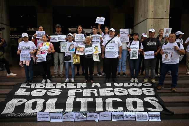 Relatives of political prisoners take part in a protest calling for their release outside the Ombudsman's Office in Caracas on  May 4, 2026. (Photo by Federico PARRA / AFP)