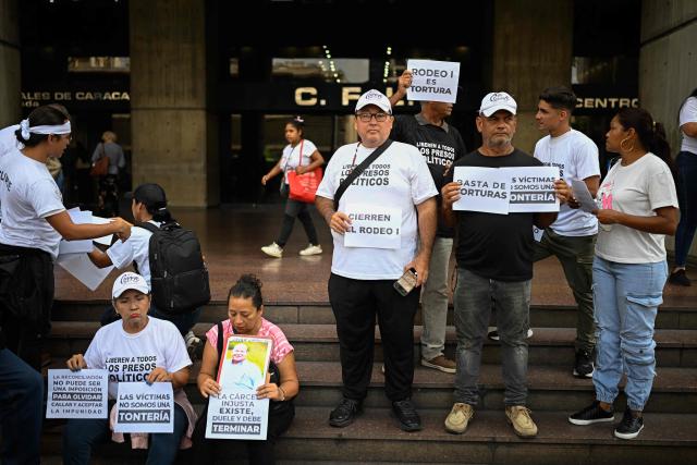 Relatives of political prisoners take part in a protest calling for their release outside the Ombudsman's Office in Caracas on  May 4, 2026. (Photo by Federico PARRA / AFP)