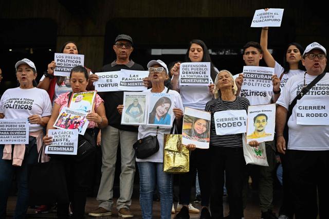 Relatives of political prisoners take part in a protest calling for their release outside the Ombudsman's Office in Caracas on  May 4, 2026. (Photo by Federico PARRA / AFP)