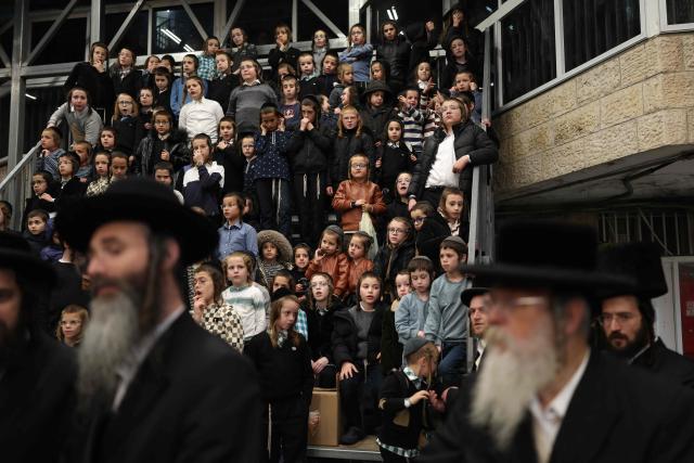 Ultra-Orthodox Jews gather at the Mea Shearim neighbourhood as they celebrate the Jewish holiday of Lag BaOmer in Jerusalem on May 4, 2026. Lag BaOmer marks the anniversary of the death of Talmudic sage Rabbi Shimon Bar Yochai approximately 1,900 years ago. (Photo by Ilia YEFIMOVICH / AFP)