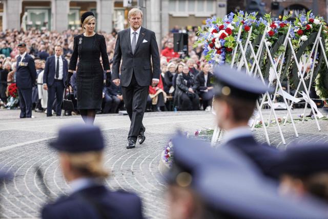 Queen Maxima (L) and King Willem-Alexander attend the National Remembrance Day ceremony on Dam Square in Amsterdam on May 4, 2026. During Remembrance Day, the victims of the Second World War in Europe and Southeast Asia are commemorated, as well as the victims of subsequent war situations and peacekeeping operations in which the Netherlands was involved. (Photo by Remko de Waal / ANP / AFP) / Netherlands OUT