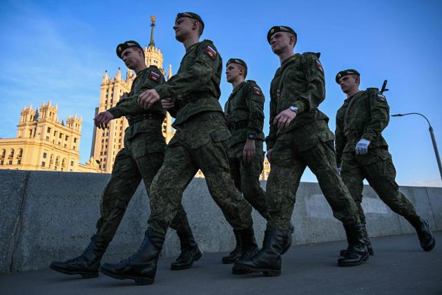 Russian servicemen prepare to attend the rehearsal of the Victory Day military parade, to be held at Red Square, in central Moscow on May 4, 2026. Russia declared on May 4 a unilateral ceasefire with Ukraine between May 8-9, when Moscow marks its annual World War II Victory Day commemorations, and threatened a "massive missile strike" on Kyiv if Ukraine violated it. (Photo by Igor IVANKO / AFP)