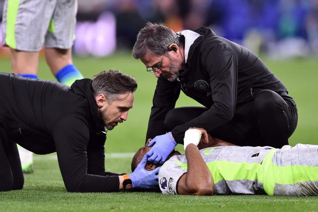 Manchester City's Ghanaian forward #42 Antoine Semenyo receives medical attention during the Premier League football match between Everton and Manchester City at Hill Dickinson Stadium in Liverpool on May 4, 2026. (Photo by PETER POWELL / AFP)