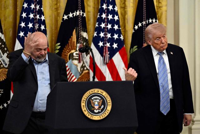 US President Donald Trump points to US businessman and reality TV star Rick Harrison as he participates in a Small Business Summit in the East Room of the White House in Washington, DC on May 4, 2026. (Photo by Kent NISHIMURA / AFP)