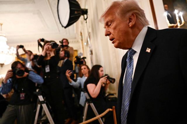 US President Donald Trump leaves after participating in a Small Business Summit in the East Room of the White House in Washington, DC on May 4, 2026. (Photo by Kent NISHIMURA / AFP)