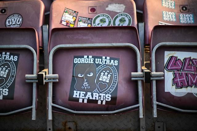Seating with stickers is pictured before the start of the Scottish Premiership football match between Hearts and Rangers at Tynecastle Stadium in Edinburgh on May 4, 2026. Hearts are hoping to become the first club other than Celtic and Rangers to win the Scottish crown since Aberdeen in 1985. (Photo by ANDY BUCHANAN / AFP)