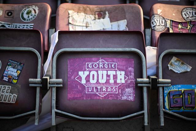 Seating with stickers is pictured before the start of the Scottish Premiership football match between Hearts and Rangers at Tynecastle Stadium in Edinburgh on May 4, 2026. Hearts are hoping to become the first club other than Celtic and Rangers to win the Scottish crown since Aberdeen in 1985. (Photo by ANDY BUCHANAN / AFP)