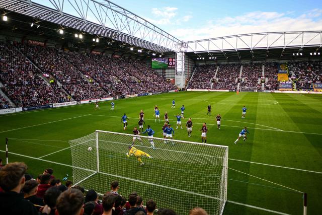Hearts' English back Dujon Sterling scores the opening goal of the match during the Scottish Premiership football match between Hearts and Rangers at Tynecastle Stadium in Edinburgh on May 4, 2026. Hearts are hoping to become the first club other than Celtic and Rangers to win the Scottish crown since Aberdeen in 1985. (Photo by ANDY BUCHANAN / AFP)