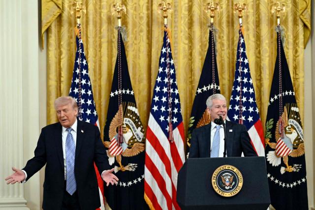 US President Donald Trump reacts as US Secretary of Energy Chris Wright speaks during a Small Business Summit in the East Room of the White House in Washington, DC on May 4, 2026. (Photo by Kent NISHIMURA / AFP)