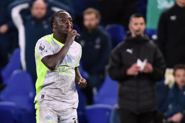 Manchester City's Belgian midfielder #11 Jeremy Doku celebrates scoring the equalizer during the English Premier League football match between Everton and Manchester City at Hill Dickinson Stadium in Liverpool on May 4, 2026. (Photo by PETER POWELL / AFP)