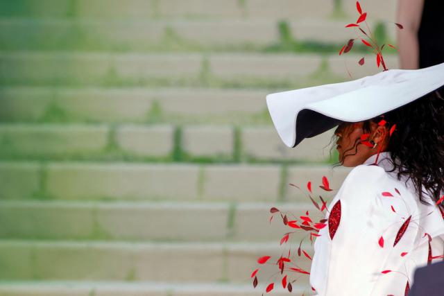 Japanese tennis player Naomi Osaka arrives for the 2026 Met Gala celebrating "Costume Art" at the Metropolitan Museum of Art on May 4, 2026, in New York. (Photo by Leonardo MUNOZ / AFP)