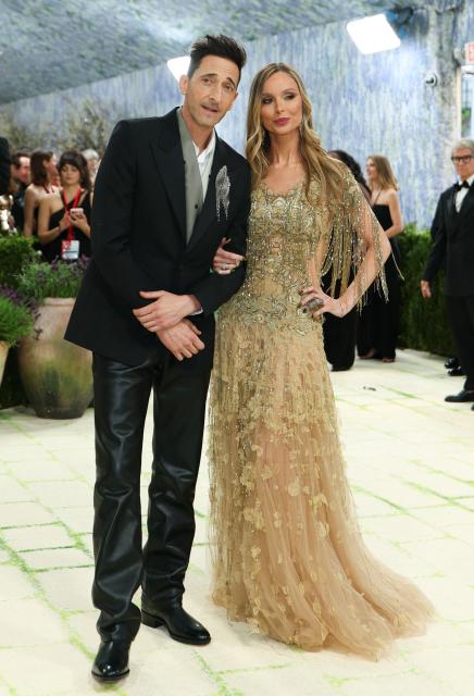 US actor Adrien Brody and British fashion designer Georgina Chapman arrive for the 2026 Met Gala celebrating "Costume Art" at the Metropolitan Museum of Art, in New York, on May 4, 2026. (Photo by ANGELA WEISS / AFP)