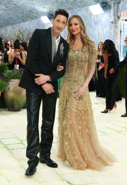US actor Adrien Brody and British fashion designer Georgina Chapman arrive for the 2026 Met Gala celebrating "Costume Art" at the Metropolitan Museum of Art, in New York, on May 4, 2026. (Photo by ANGELA WEISS / AFP)