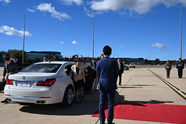 Japan’s Prime Minister Sanae Takaichi steps out of her car at a Royal Australian Air Force base in Canberra on May 5, 2026, ahead of her departure following a three-day official visit to Australia. (Photo by Saeed KHAN / AFP)