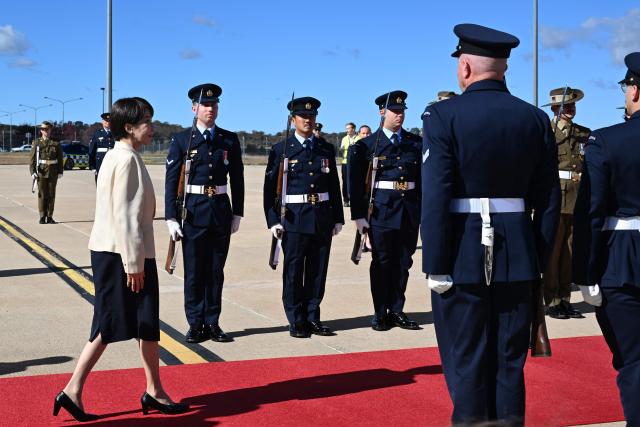 Japan’s Prime Minister Sanae Takaichi walks towards her aircraft at a Royal Australian Air Force base in Canberra on May 5, 2026, ahead of her departure following a three-day official visit to Australia. (Photo by Saeed KHAN / AFP)