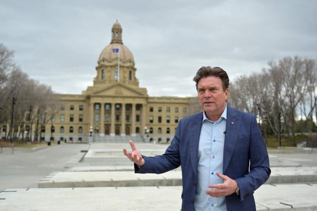 Former Alberta deputy premier and activist for the federalist side Thomas Lukaszuk speaks in front of the Alberta provincial legislature in Edmonton, on May 3, 2026. Separatists who want oil-rich Alberta to break away from Canada head to the provincial capital Edmonton on May 4, 2026 to submit a petition that they say has enough signatures to force a referendum. The pro-independence camp in the western province of five million people had existed on the margins for decades, but the movement has gathered pace in recent months and is closer than ever to triggering a vote. (Photo by Daphné LEMELIN / AFP)